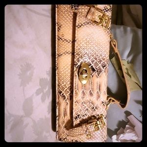 Snakeskin print clutch